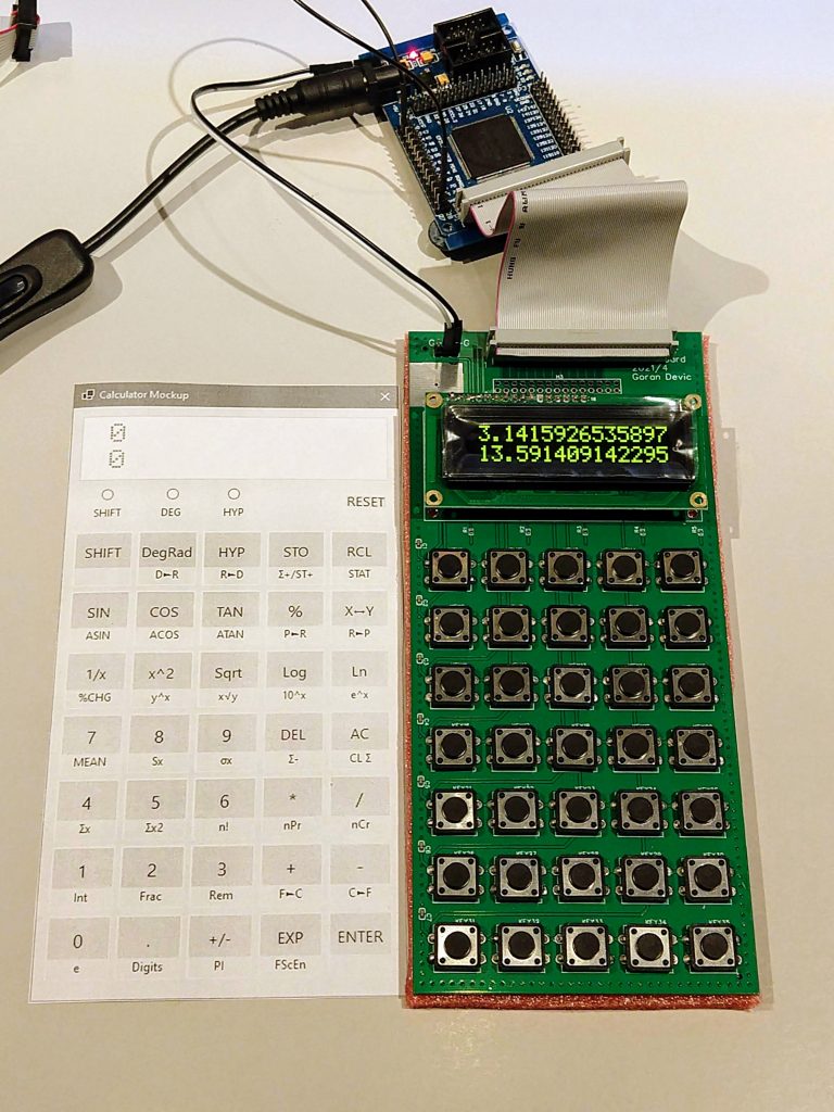 Rev A: the EP2C5 dev board (left) and the keypad/LCD board (right), connected by a 40-pin ribbon cable.
