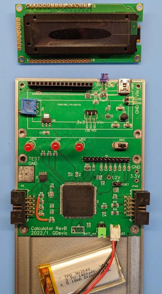 Rev B: everything on one board. The FPGA is the large TQFP in the center; the OLED sits at the top.